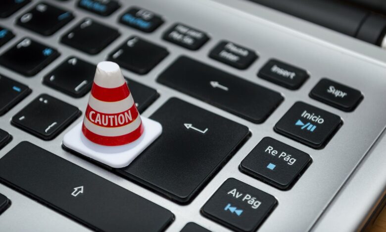 white caution cone on keyboard