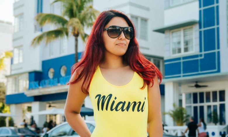 woman in swimsuit and jeans on streets of miami